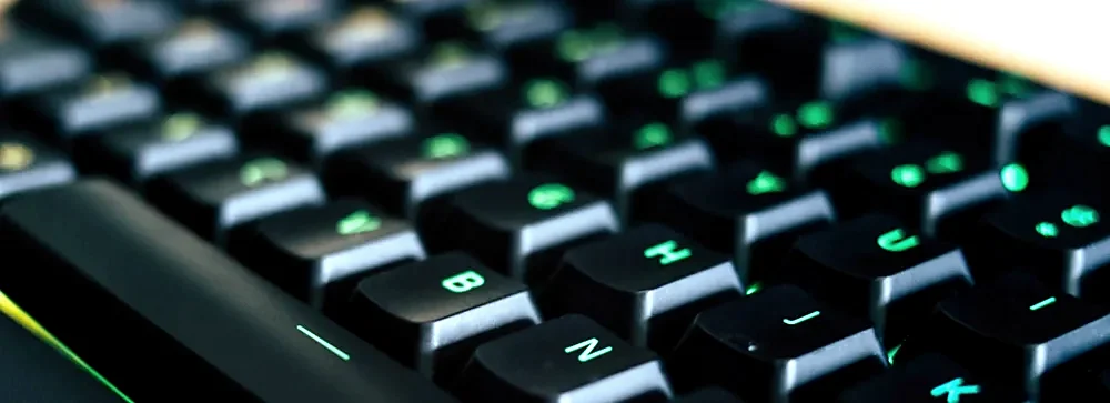 A backlit keyboard with green keys